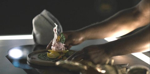 Ricotta Ravioli with pesto sauce and blood orange foam